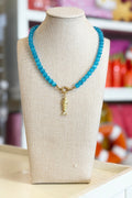 Kerry Necklace - Blue + Gold Fish
